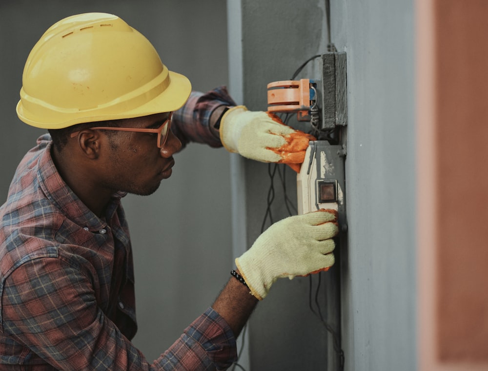 Electrician working on a consumer unit
