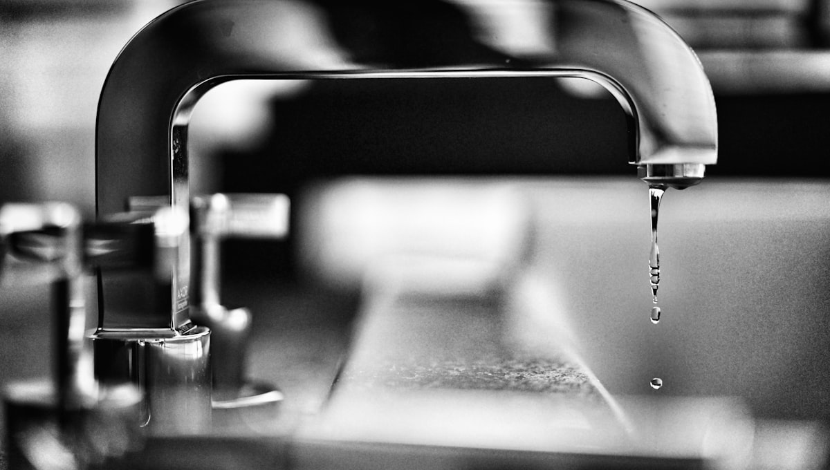 Tap macro, mid-repair, low light